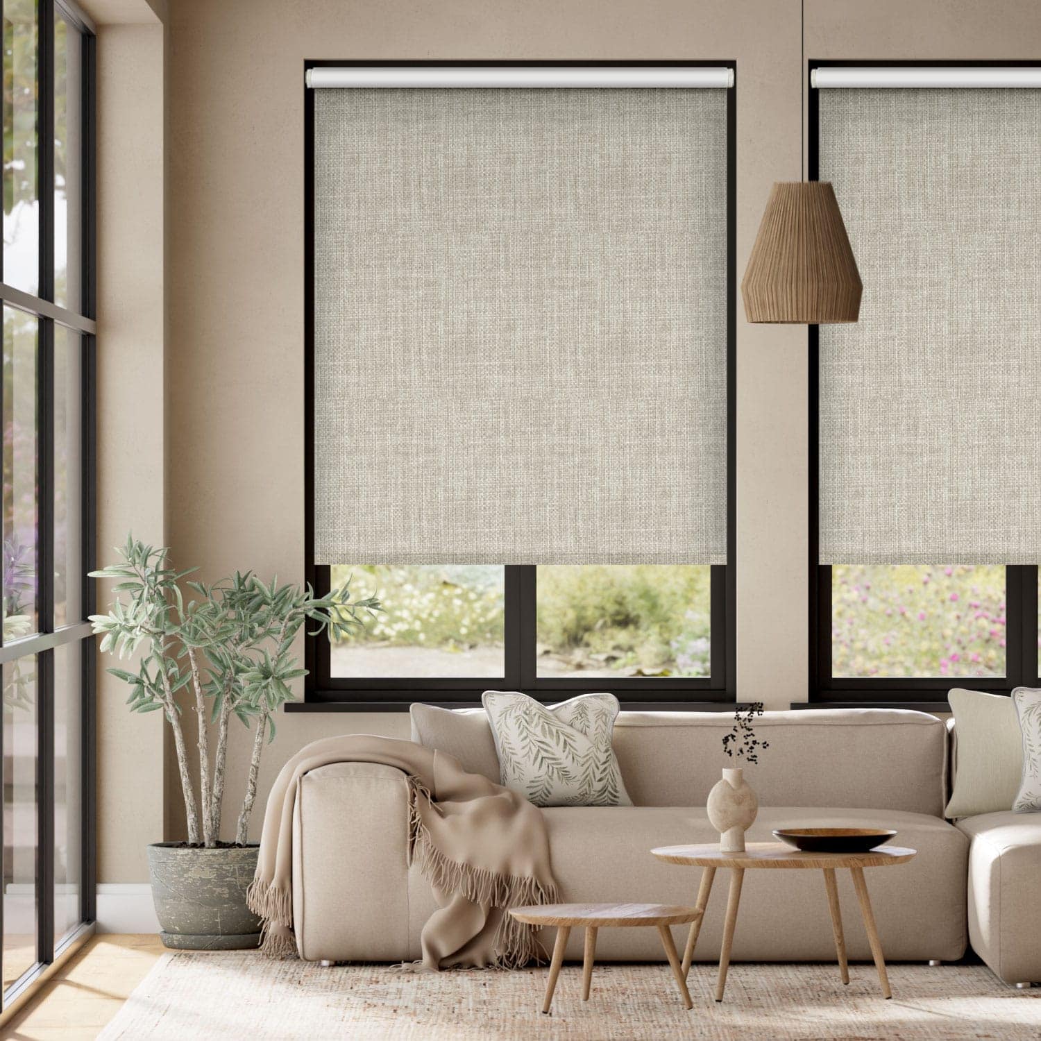 Blackout roller blind with a textured look fabric, in stone grey