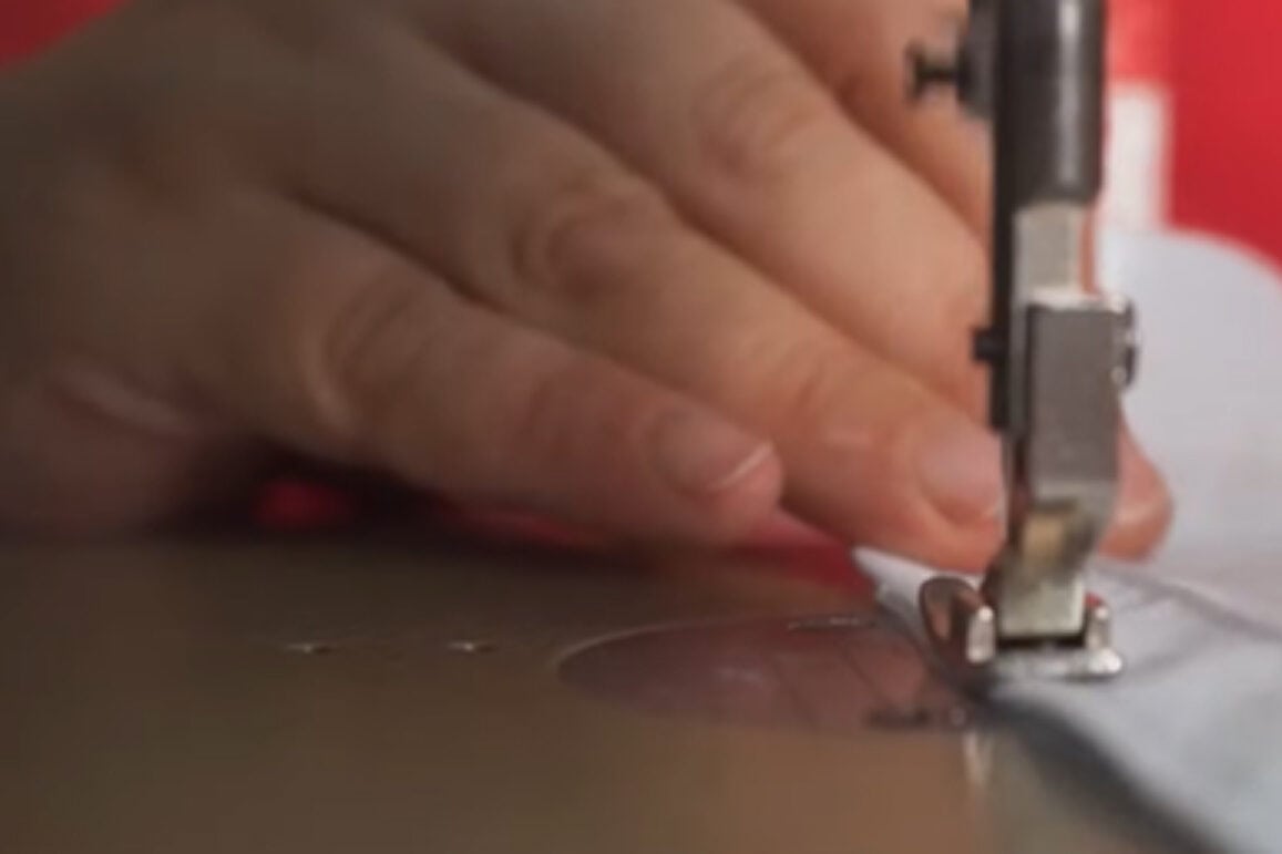 sewing machine stitching curtain fabric