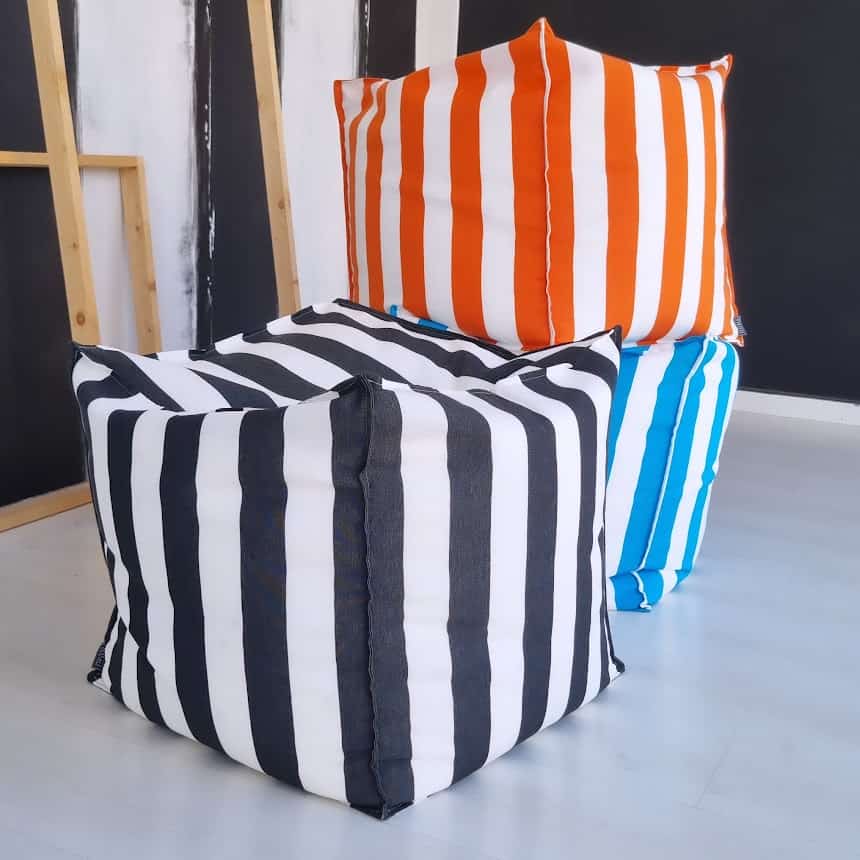 Striped custom poufs with outdoor fabric, available in store or custom orders