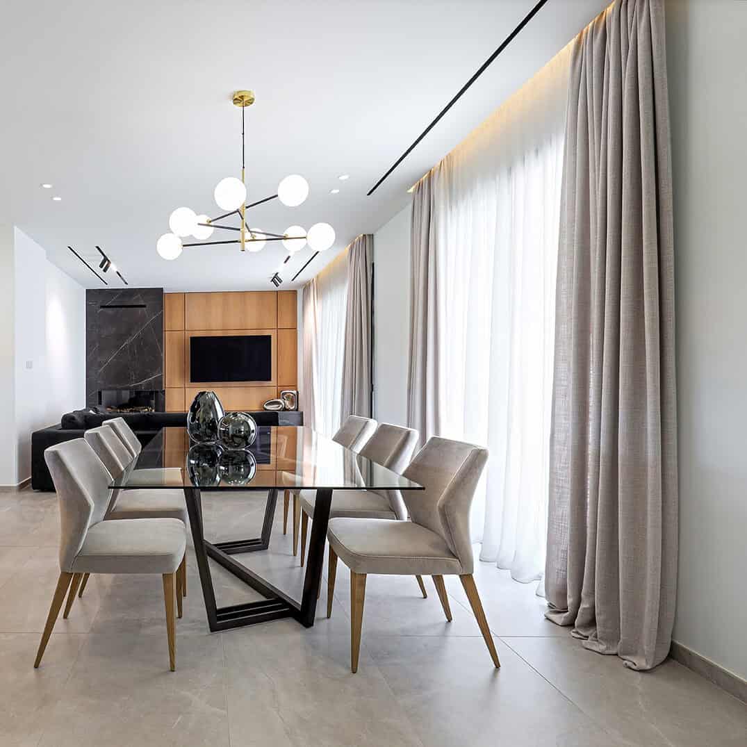 Double ceiling rails with white sheer curtains and beige drapes. Pooling 15cm