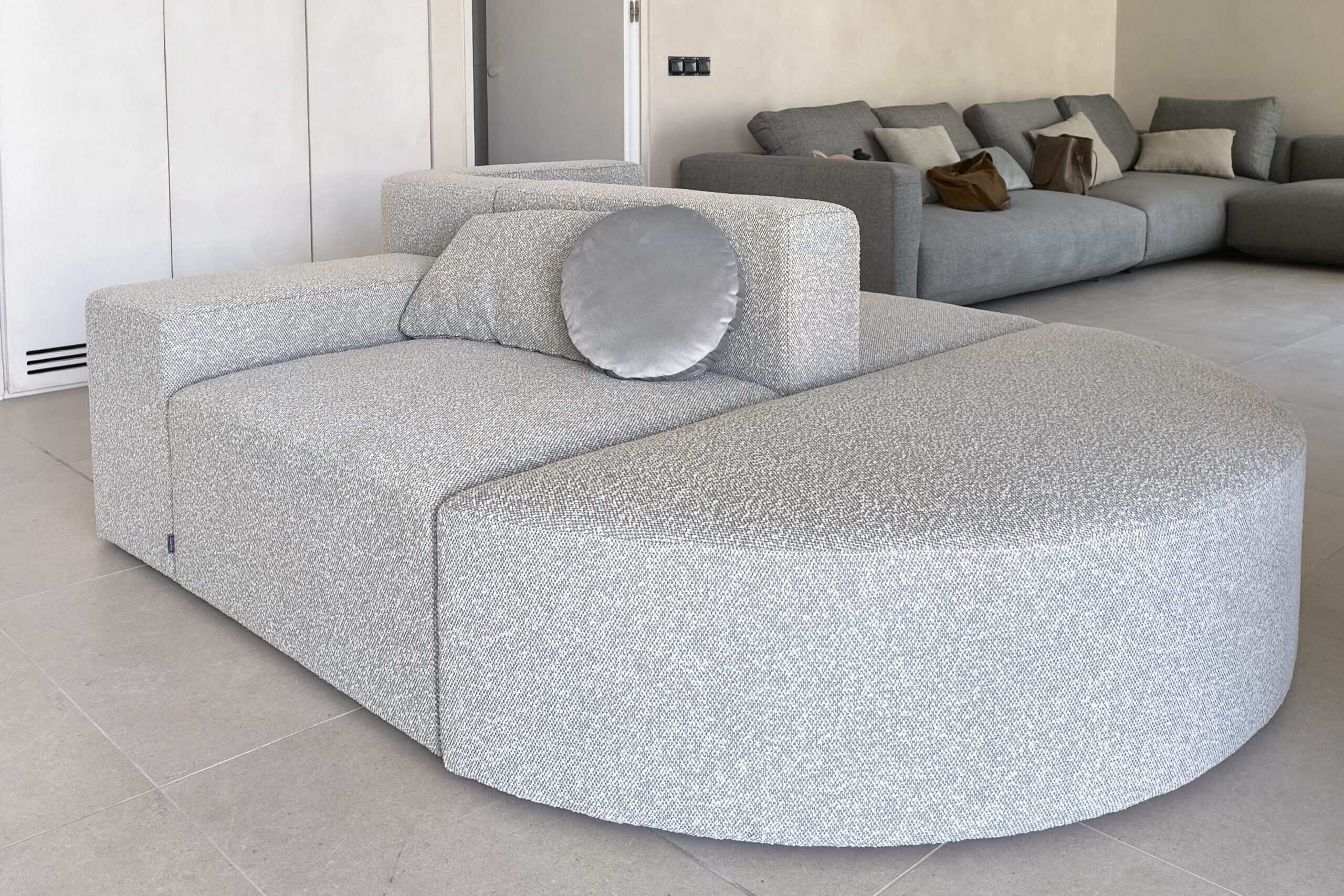 a custom shaped, double-sided sofa