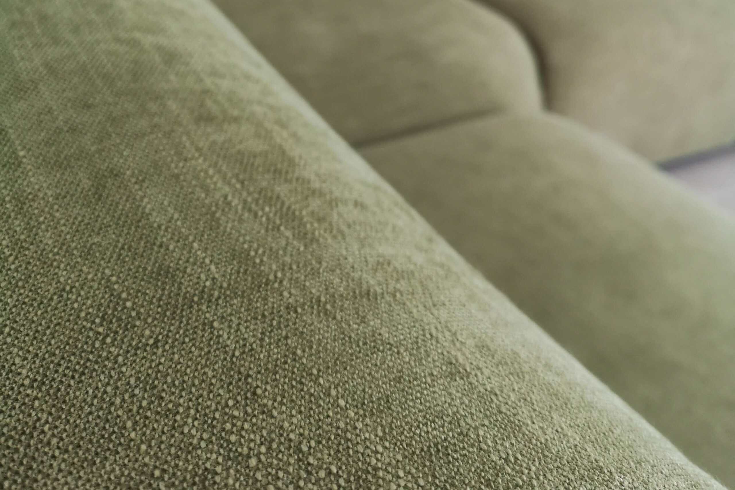 Photo of sofa upholstery in green