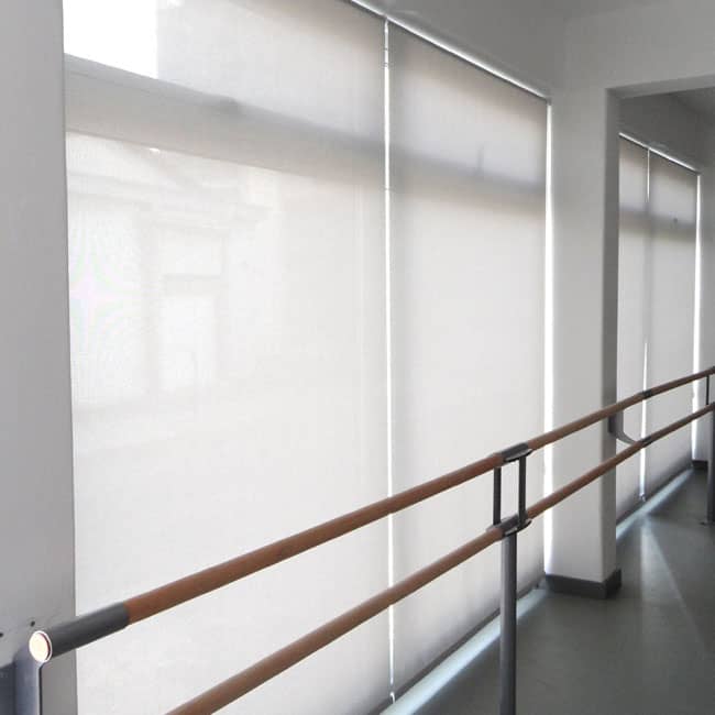 Screen roller blinds in a ballet school for natural daylight with sun protection