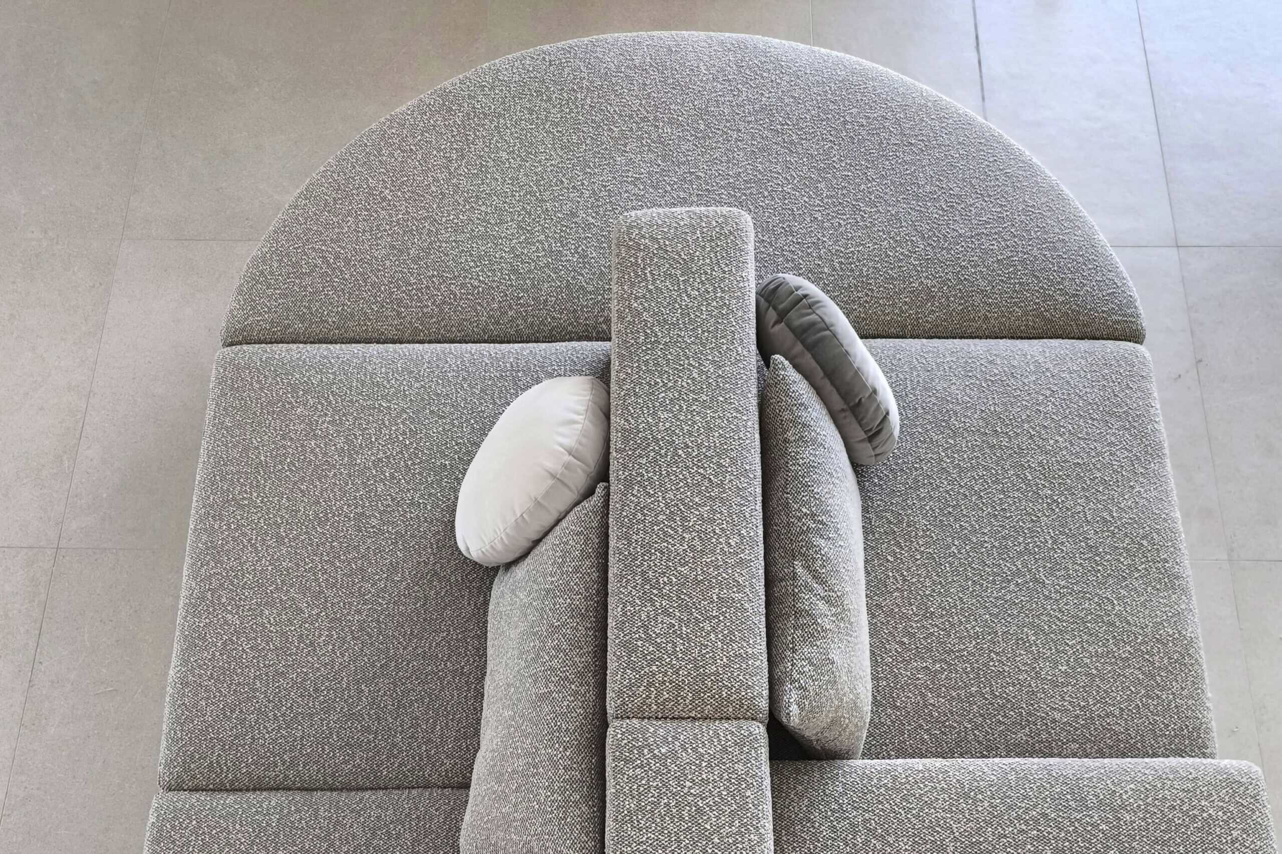 a custom shaped, double-sided sofa