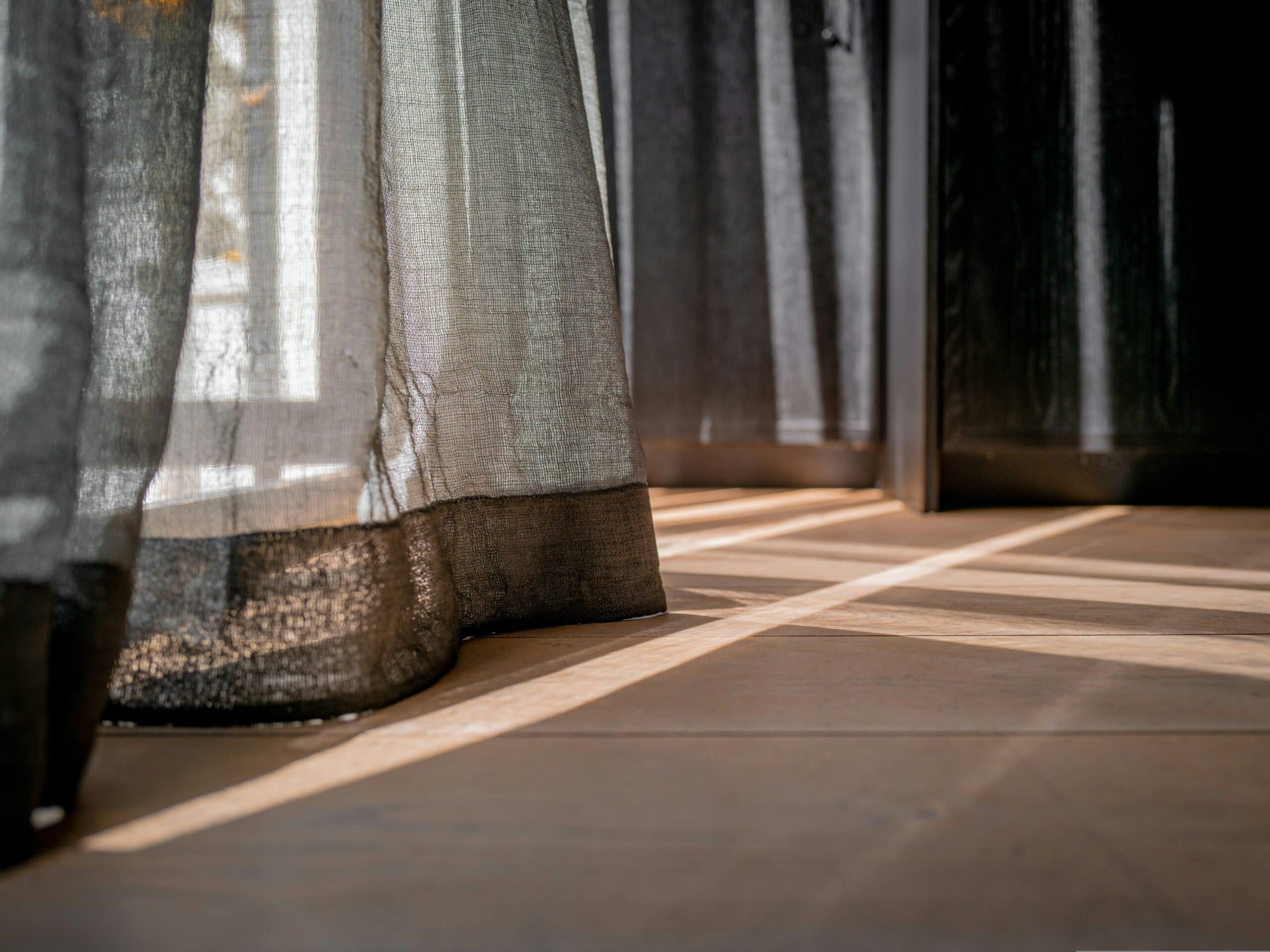 Close up of curtain touching the floor 