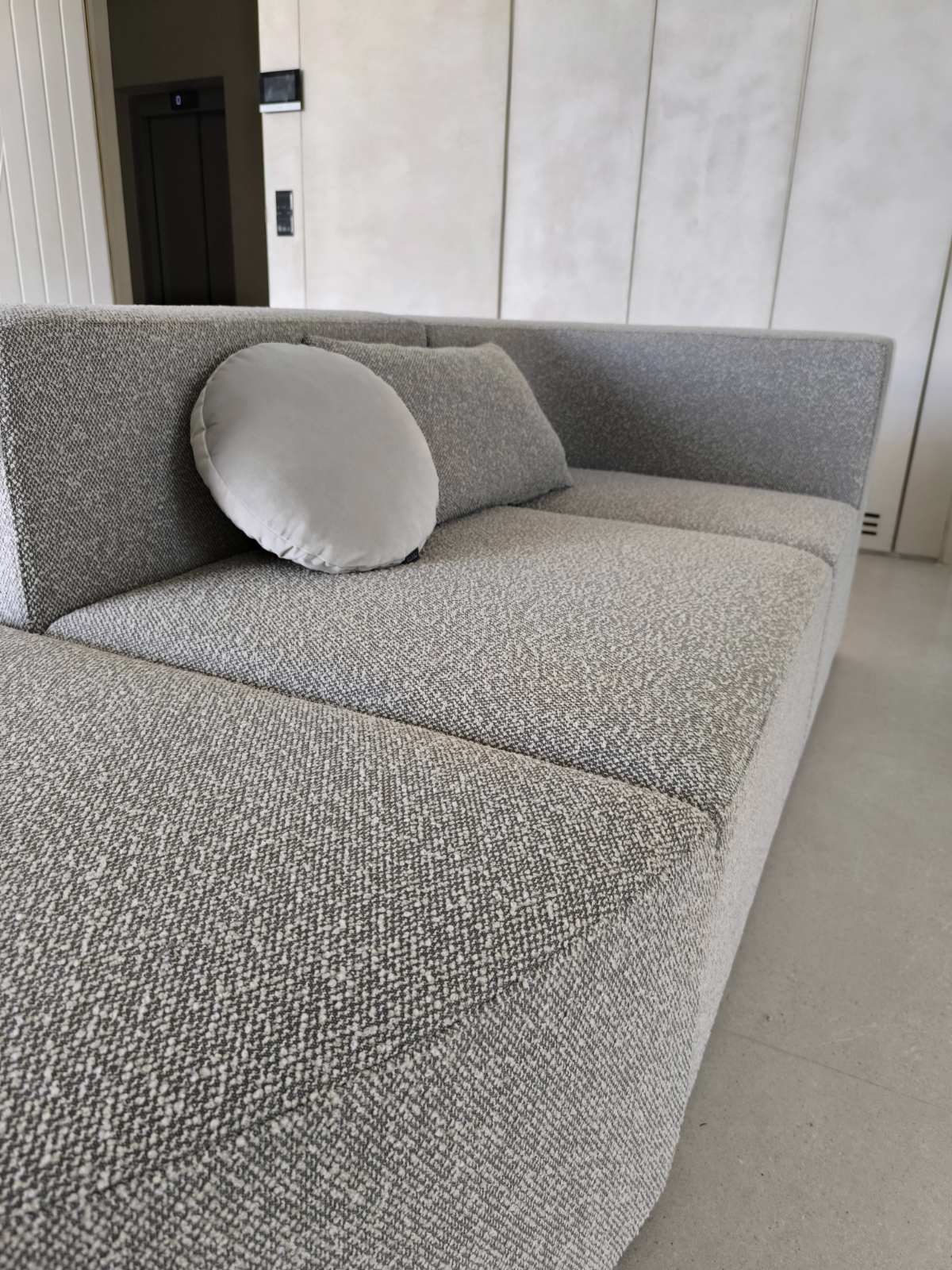 Custom curved sofa with round and rectangular cushions