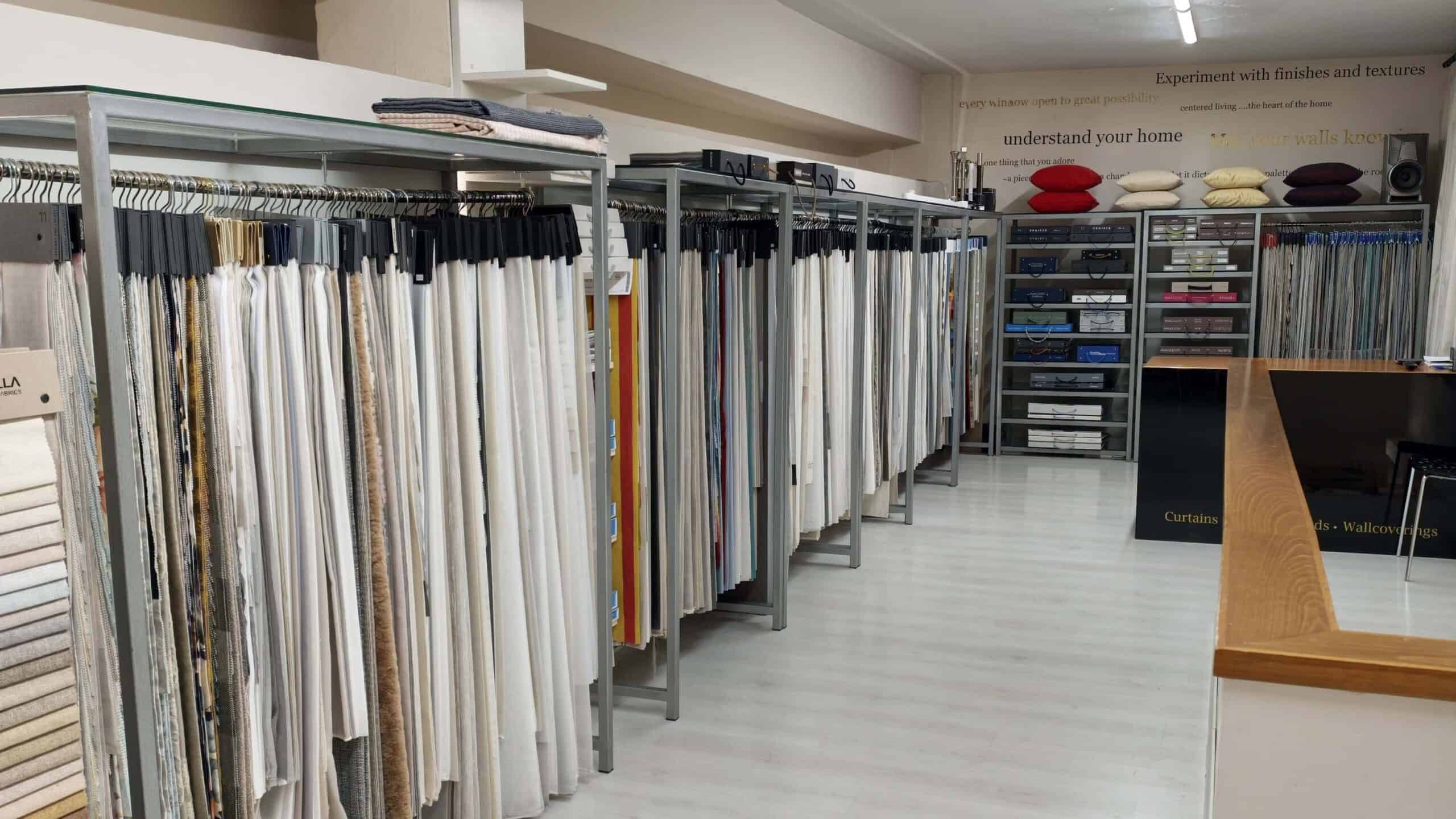 Showroom with lots of fabric samples and catalogues.