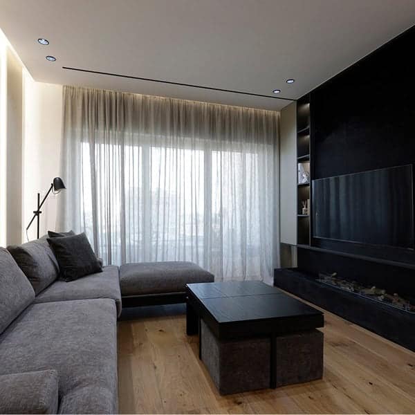 Semi-sheer linen look curtains in open-plan living room