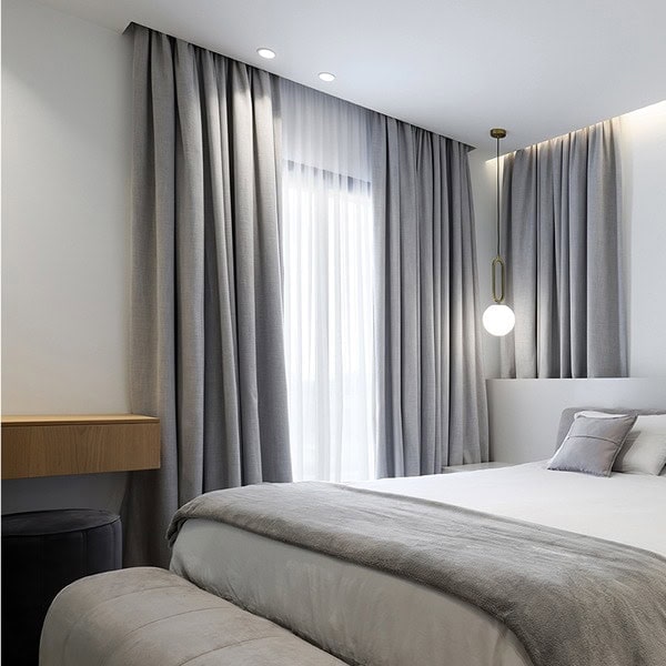 Master bedroom sheer curtains, and textured grey curtain with blackout lining
