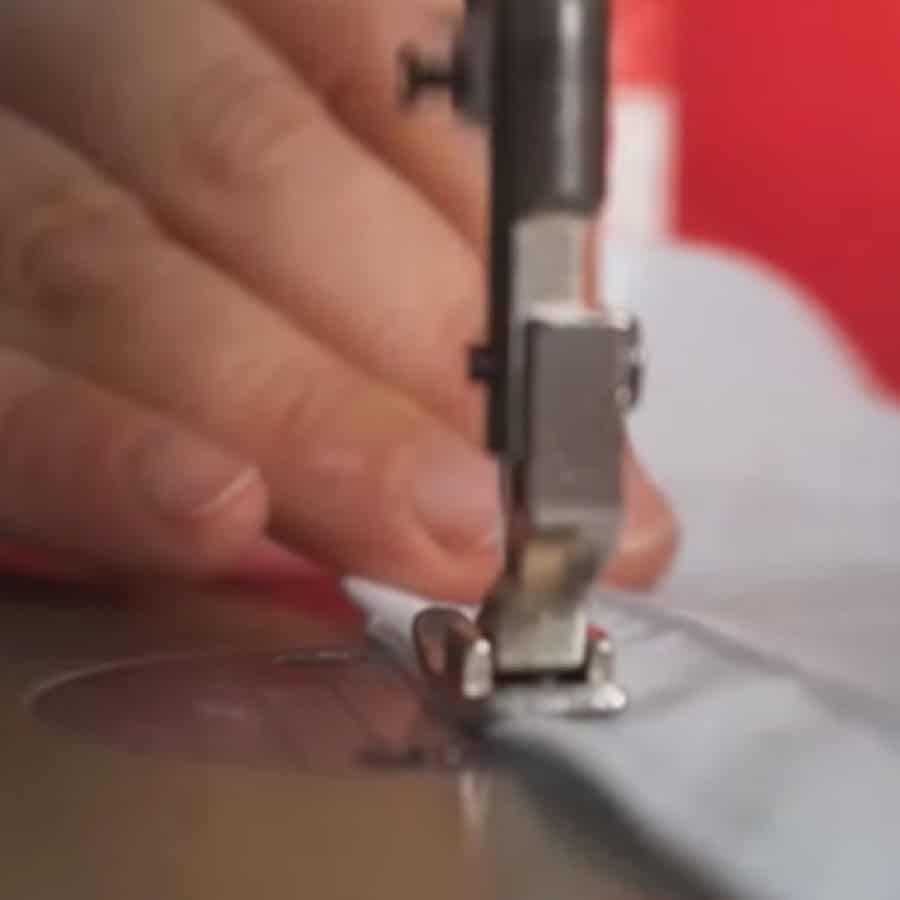sewing machine stitching curtain fabric